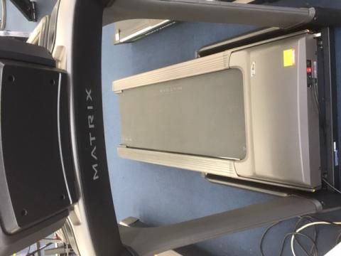 Photograph of treadmill showing front of treadmill and mat|480x360